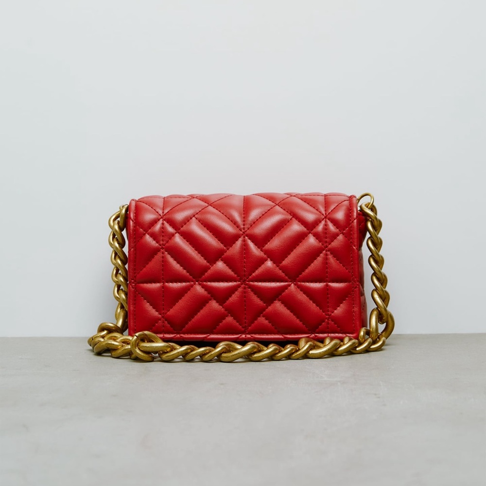 Red quilted chain shoulder bag